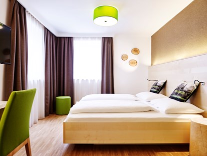 Naturhotel - Nichtraucherhotel - Doppelzimmer Superior Gartenhaus - Das Grüne Hotel zur Post - 100% BIO